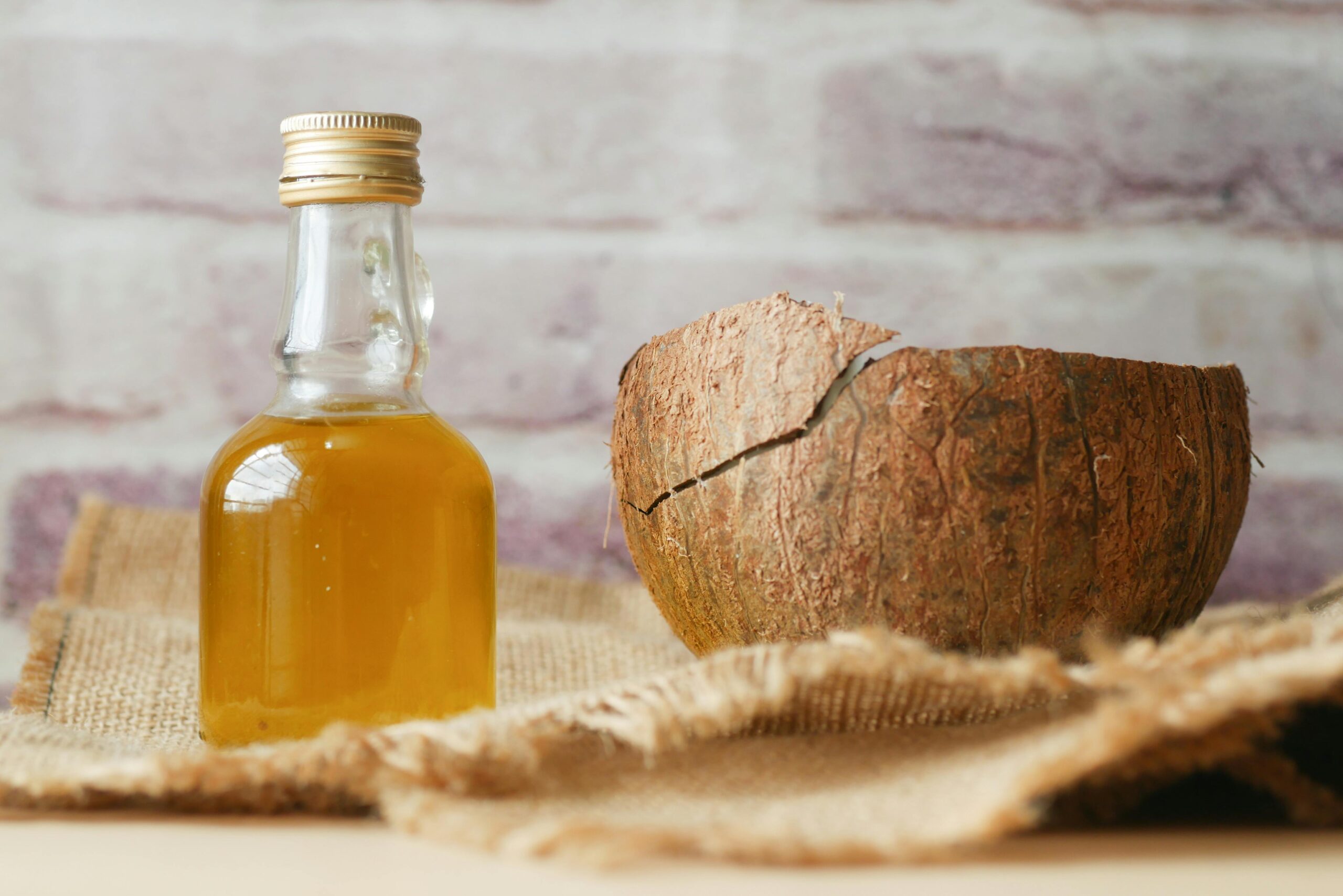 Jar of coconut oil used for natural flea treatment on dogs." 